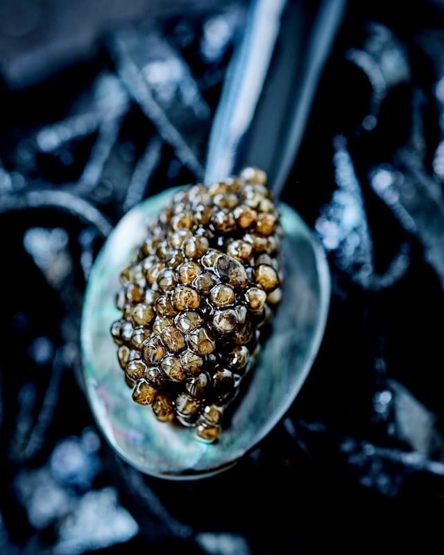 Caviar served on a mother-of-pearl spoon